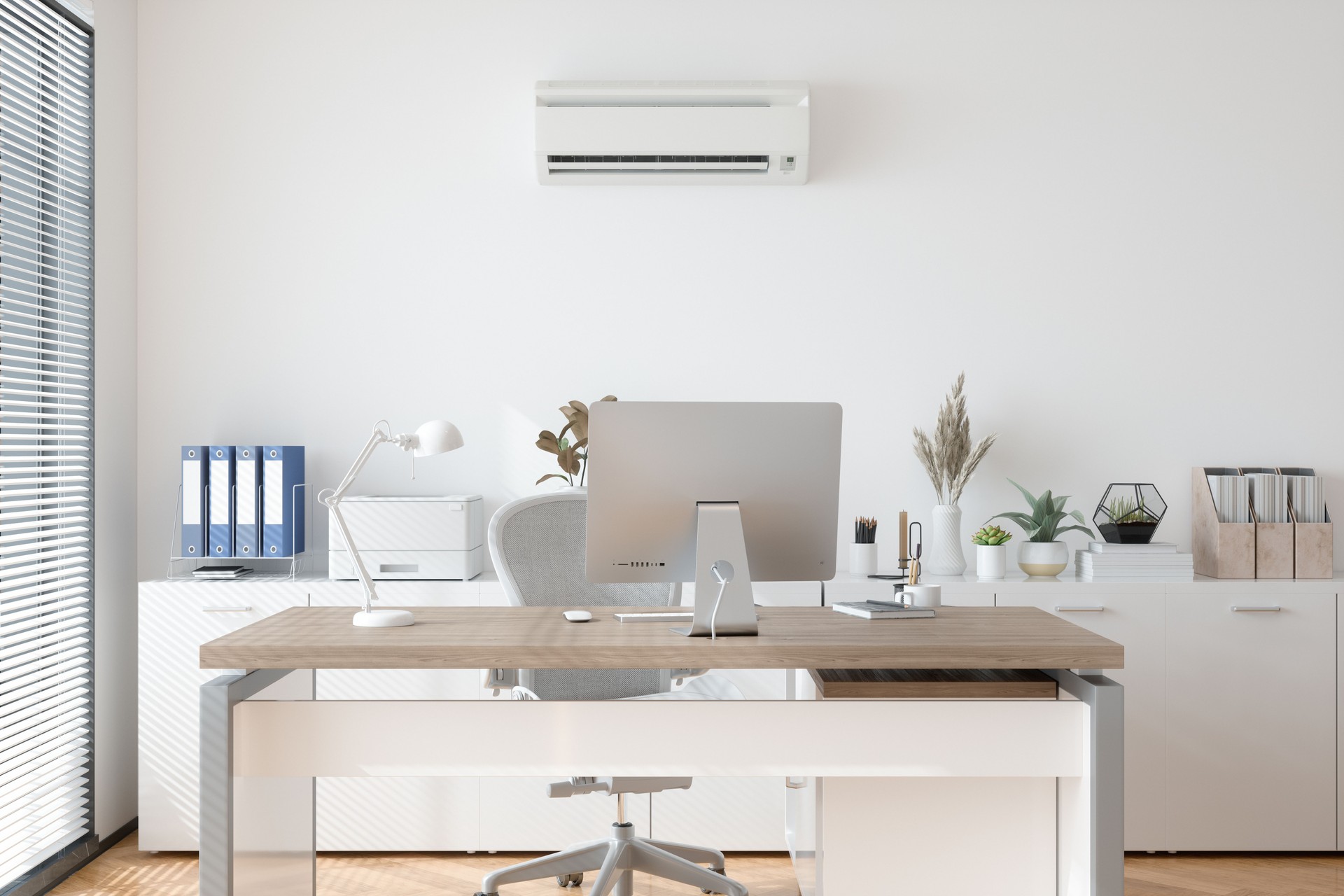 Modern Office Interior With Air Conditioner, Table, Desktop Computer And Cabinets